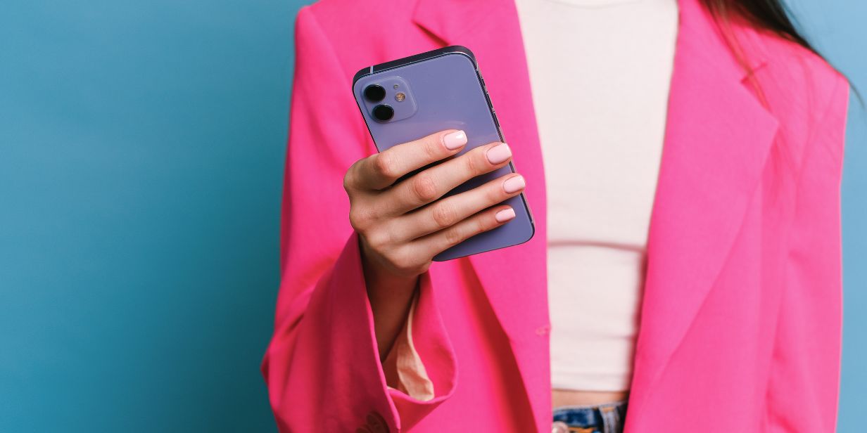 Woman looking at phone screen.